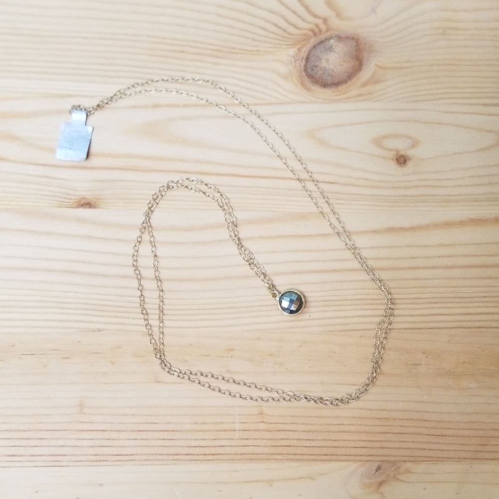 Delicate, long necklace with hematite pendant
